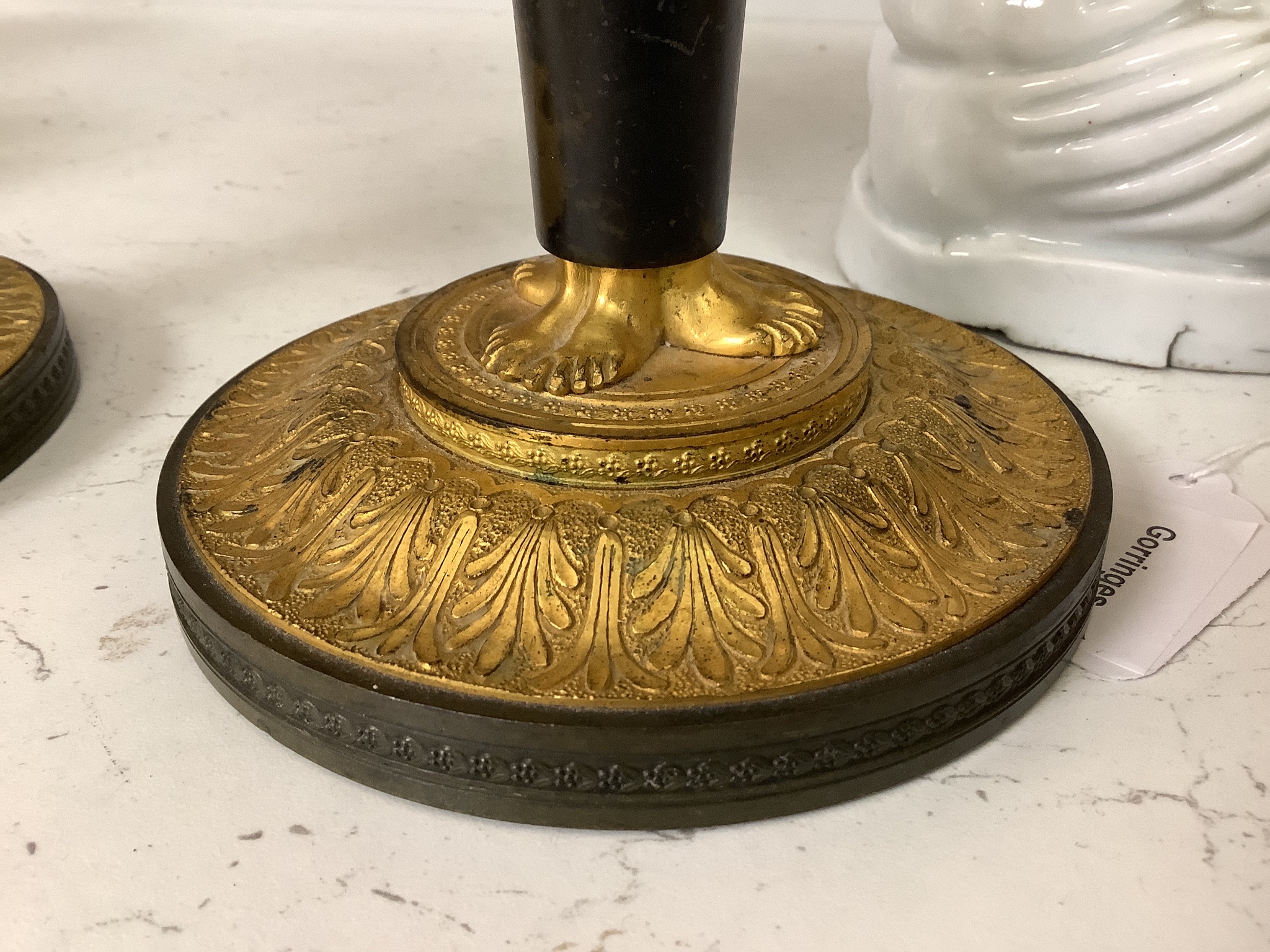 A pair of 19th century bronze and ormolu figural candlesticks, height 25cm